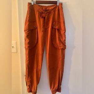 Vibrant Orange Cargo Pants by YFB